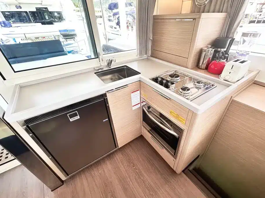 The modern galley of a sailing yacht stocked for a trip