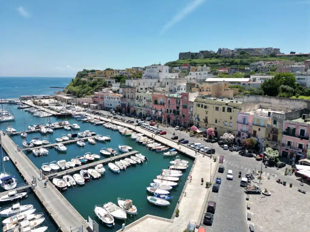 The colourful harbour of Procida in the Bay of Naples, full of boats